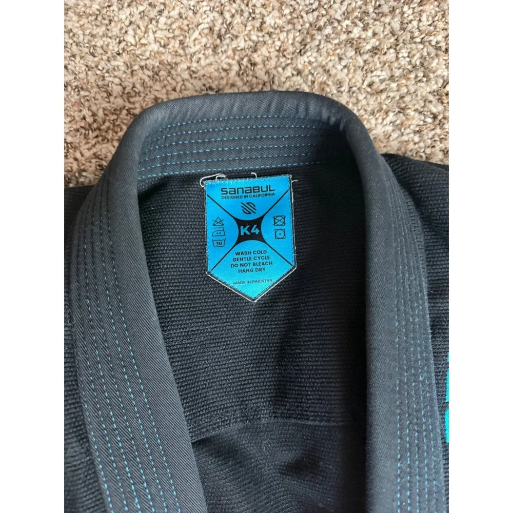 Sanabul Blu Neo Kids BJJ Gi Kimono Top Black Turquoise Blue Size K4